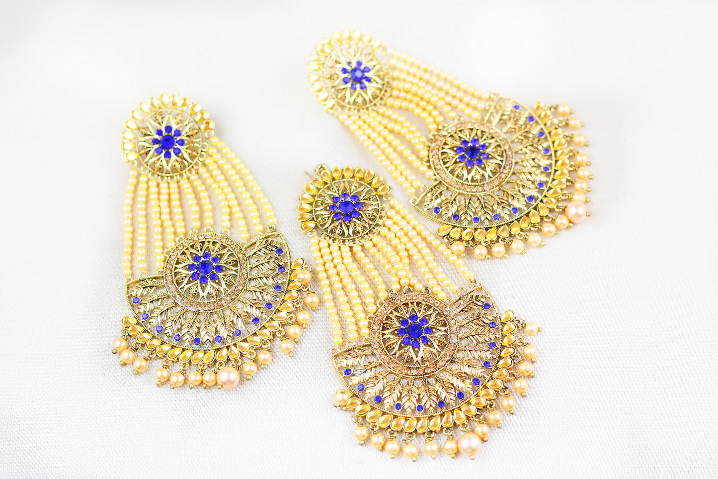 ROYAL BLUE RHINE STONE WITH PEARL CHAINS TIKKA SET