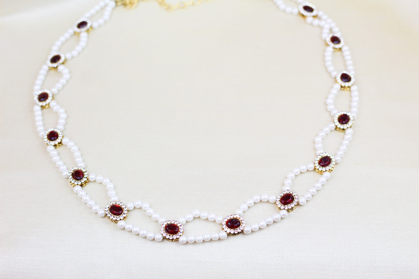 DOUBLE PEARL CHAIN AND RED STONE WAIST BELT